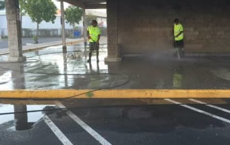 sidewalk at commercial property being power washed
