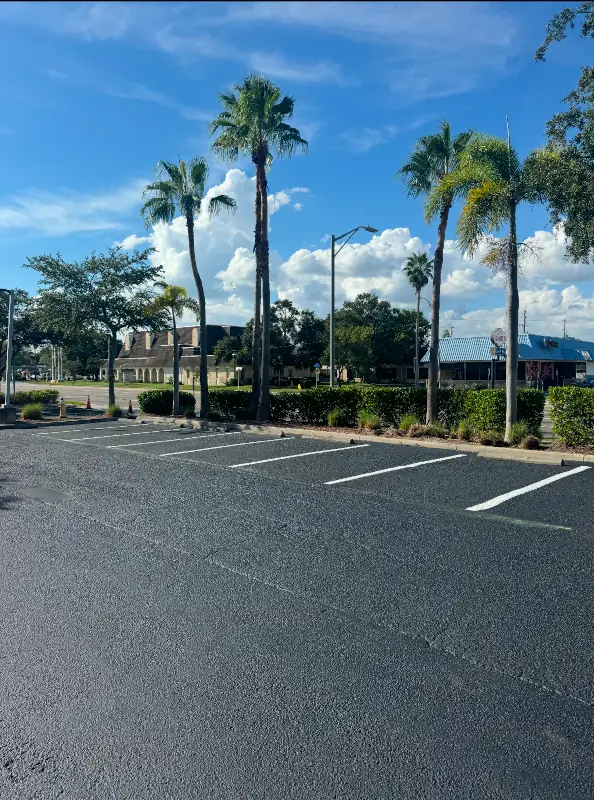 Parking lot with new asphalt sealcoating